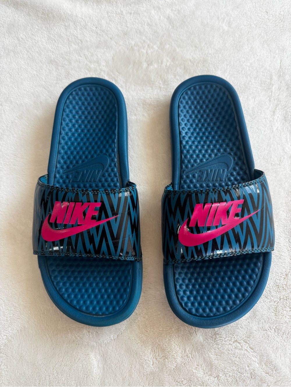 Nike Blue Slide Sandals with Pink Logo